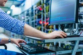 IT server room with technician