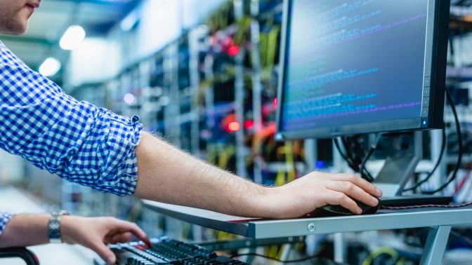 IT server room with technician